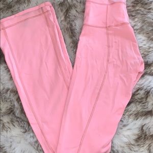 Pink LuluLemon flared yoga pants